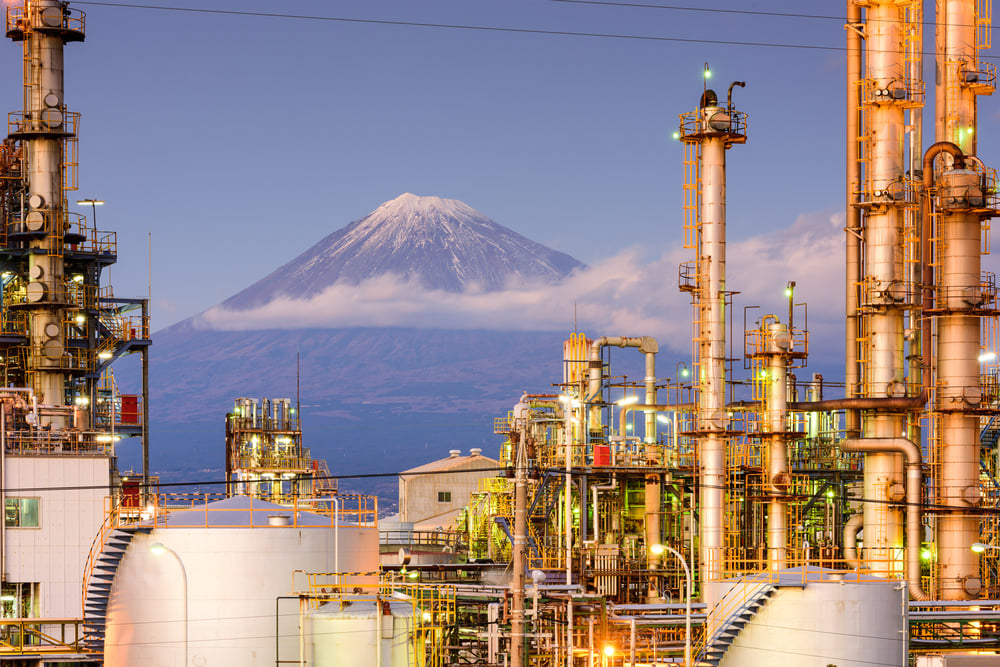 Mt. Fuji, Japan viewed from behind factories.